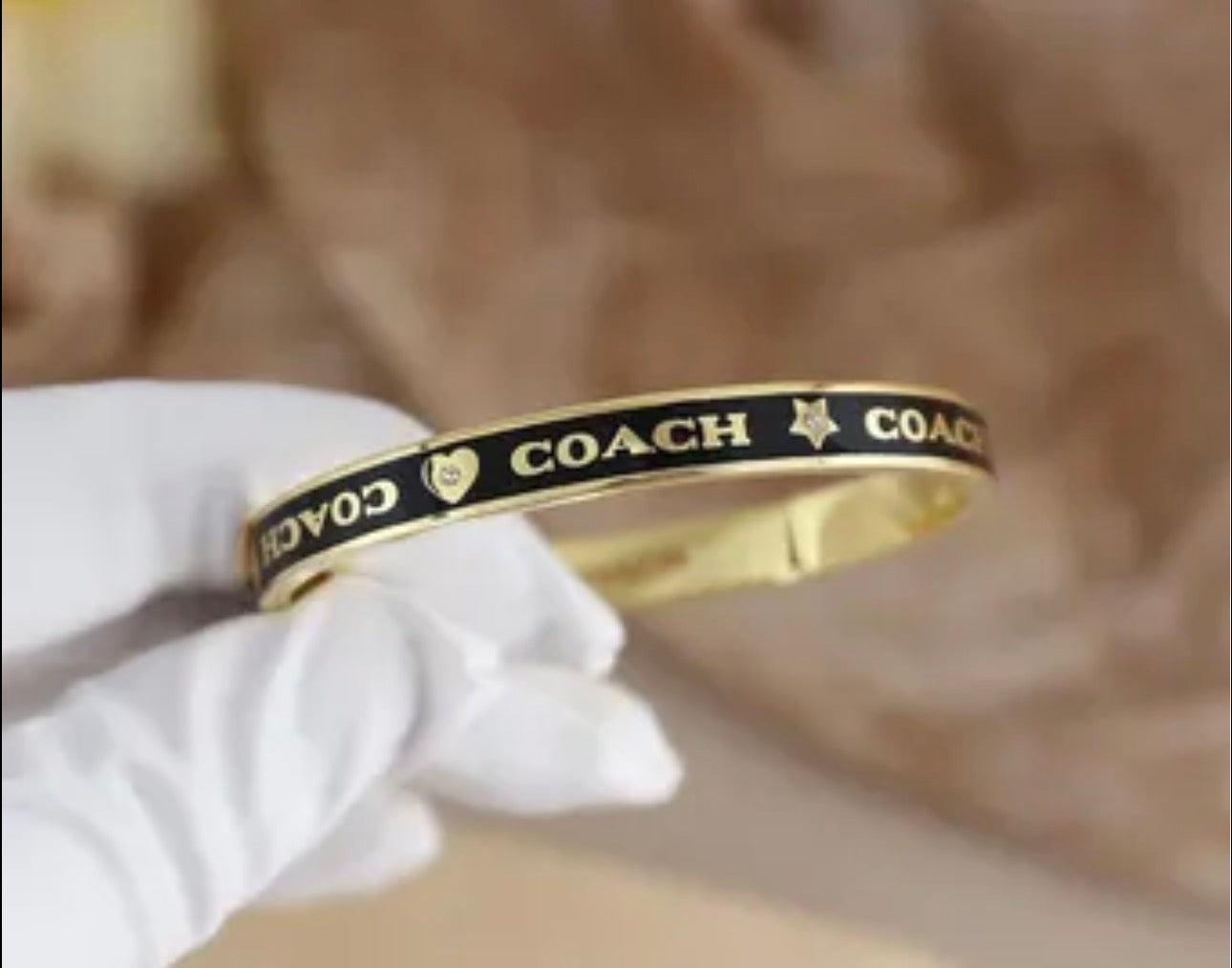 Coach Black & Gold Hinged Bangle Bracelet