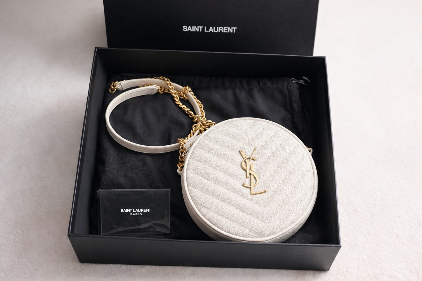 Saint Laurent Grain de Poudre Chevron Round Camera Bag in White 🤍